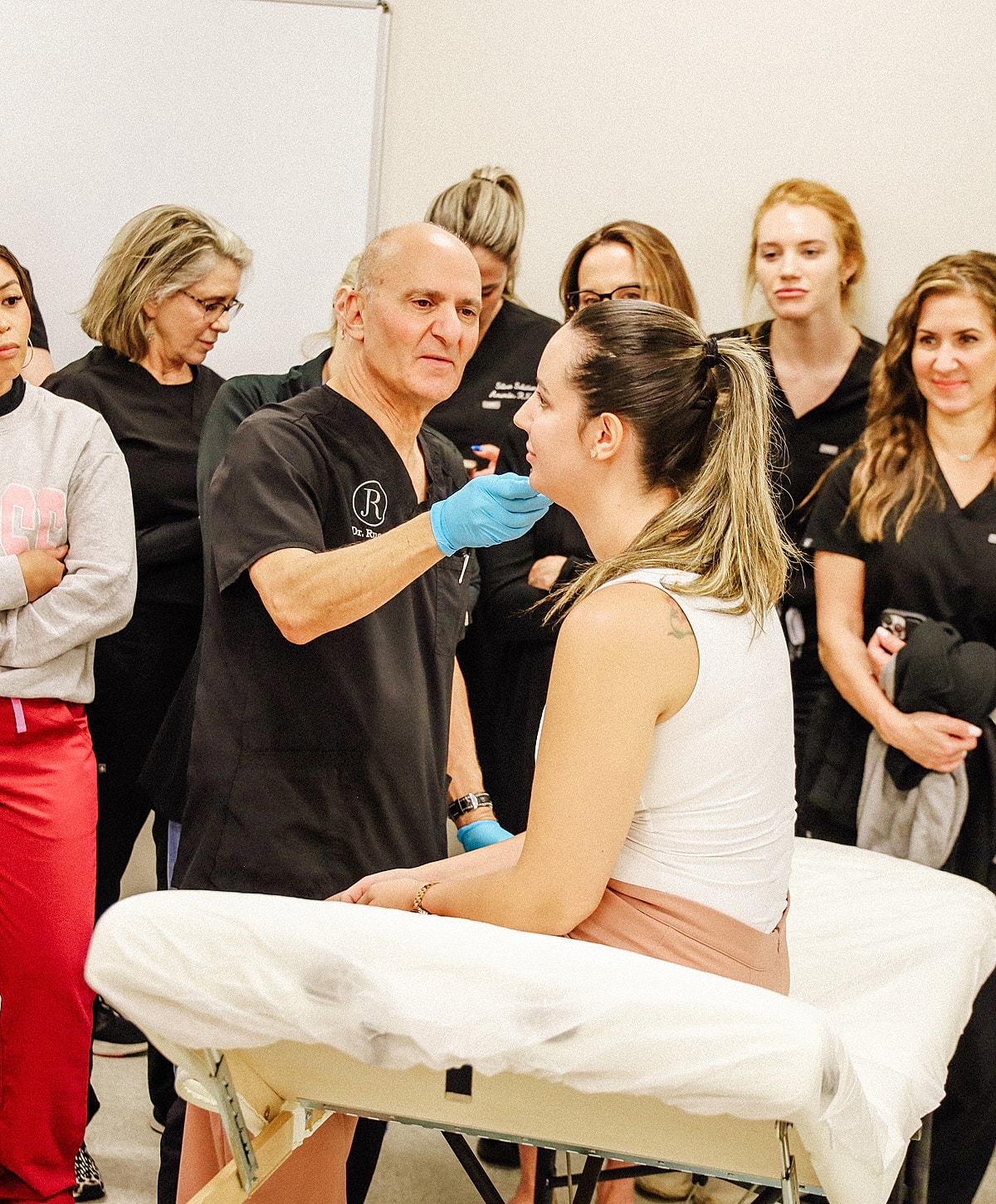 Therapist performing treatment in a clinical setting.