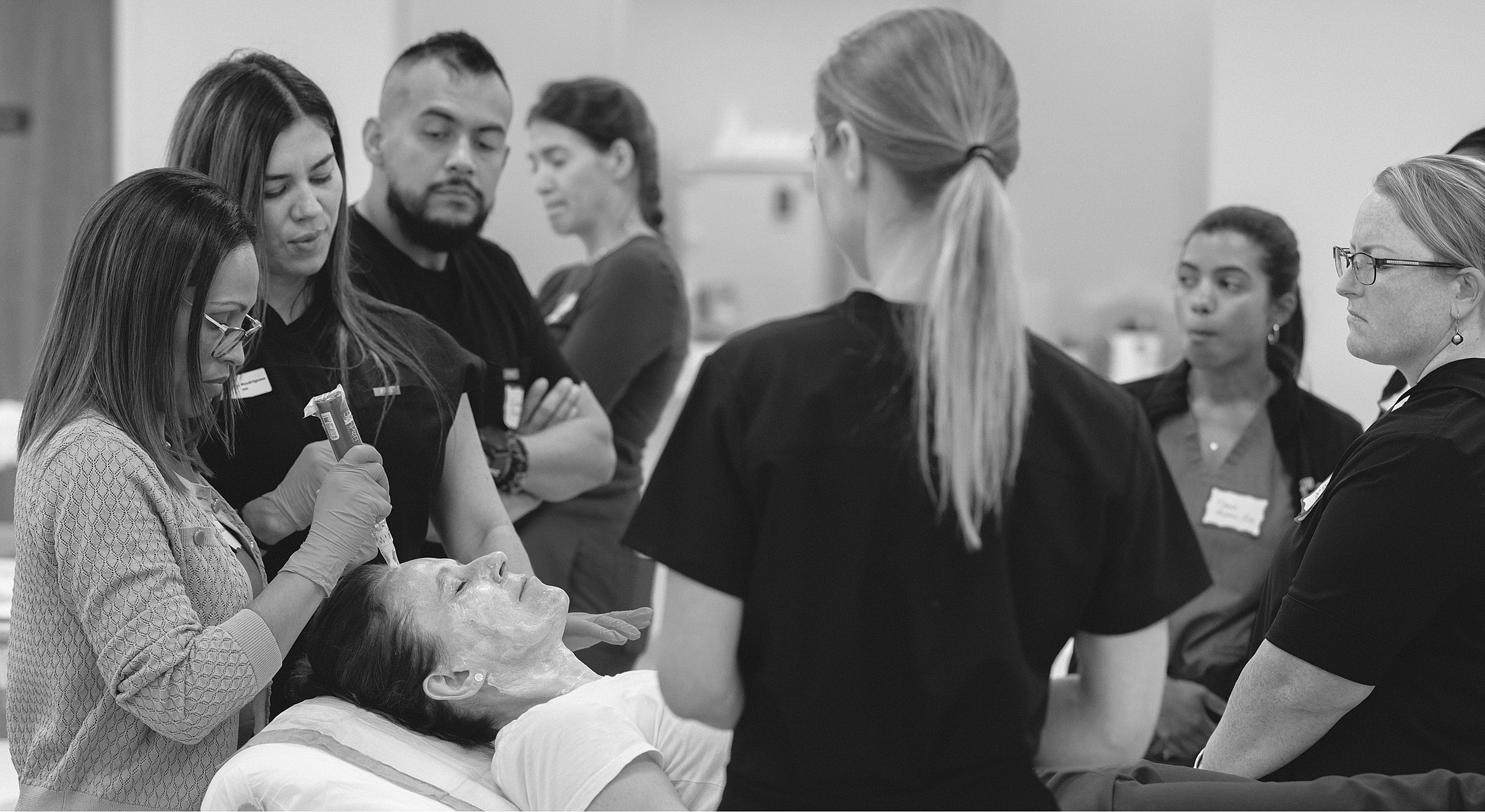 Training session for skin treatment techniques.